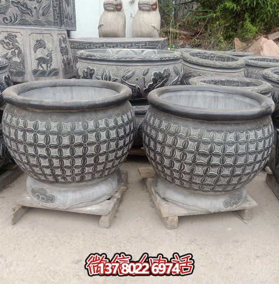 自然美學(xué)結(jié)合青石石雕、浮雕、編織、雕塑的戶外園林魚缸